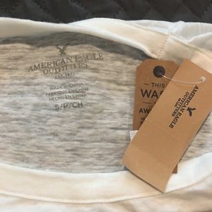 American Eagle white graphic shirt.